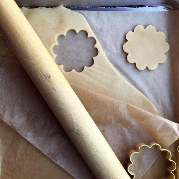 cutting out cookies in dough