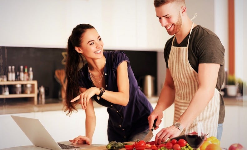 couple taking cooking class